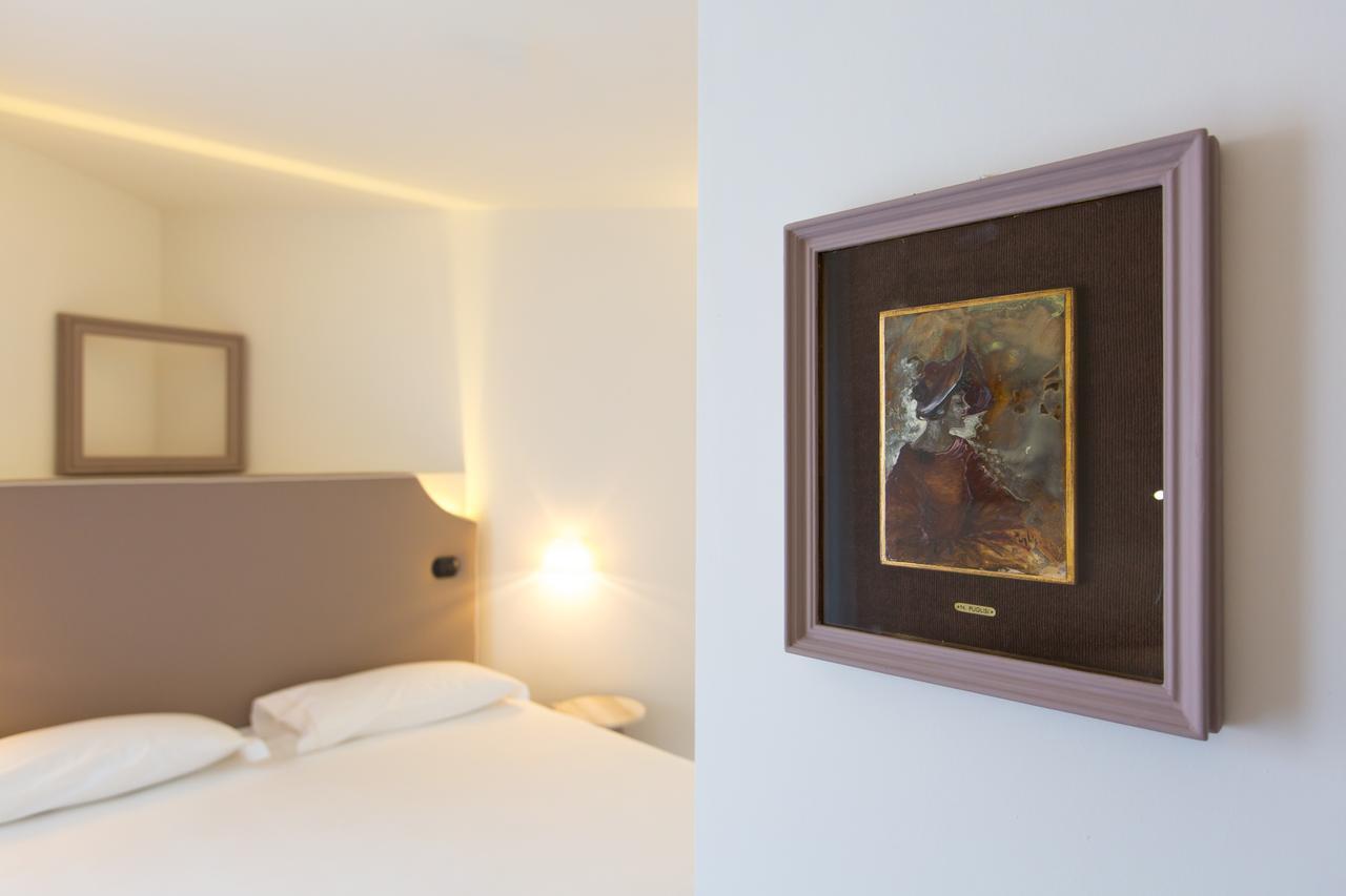 Hotel Al Campanile - Luxury Suites & Apartments Baveno Eksteriør billede